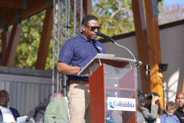 ACMSimons Assistant City Manager Speaking at the podium at the Grand Re-Opening for Finlay Park